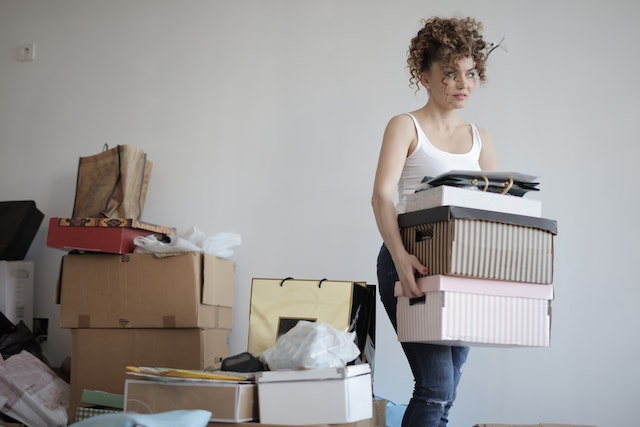 a woman preventing clutter creep into her home