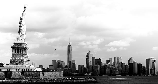 The Statue of Liberty and the panoramic view of NYC, representing what will happen to New York City real estate next year