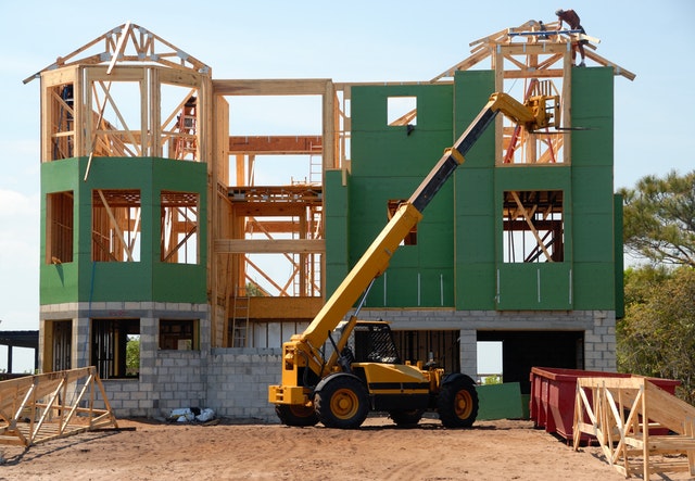 A house being built on a construction site.