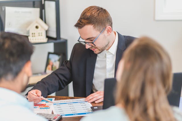 Real estate agent explaining how to find your dream home to their clients